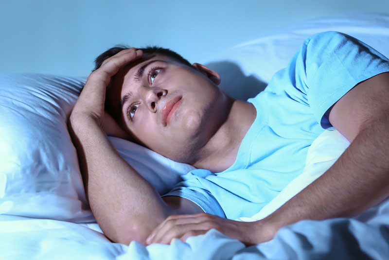 man with sleep disorder trouble sleeping
